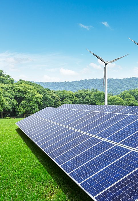 Solar panels and wind turbines in green grass field Solar panels and wind turbines in green grass field